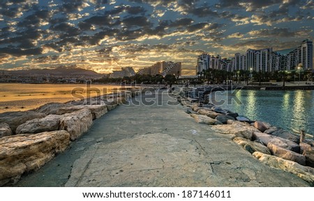 View on central beach of Eilat from walking stony pier, Israel
