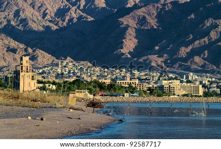 View on the border between Eilat (Israel) and Aqaba (Jordan) cities, both located on the northern beach of the gulf of Aqaba, Red Sea