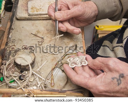 hands of  jeweller at work