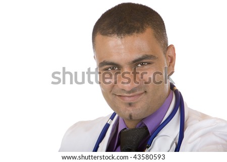 Medical doctor with crossed arms, standing self confident and looks into camera. Isolated on white.
