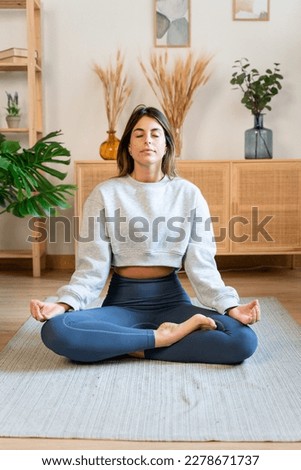 Similar – Image, Stock Photo Barefoot woman meditating on wooden path