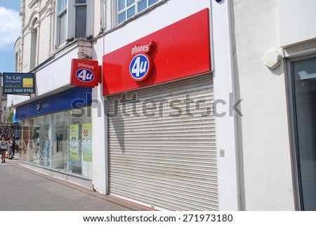 HASTINGS, ENGLAND - APRIL 22, 2015: The exterior of a Phones 4U mobile phone store. Founded in 1987, all 720 UK outlets closed down in September 2014 after the company went into administration.