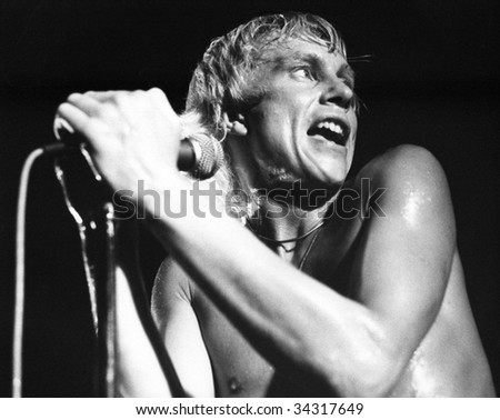 LONDON-JULY 21: Andy Ellison, lead singer of British pop group Radio Stars, performs live on stage on July 21, 1978 in London. He had previously been in John\'s Children with the late Marc Bolan.