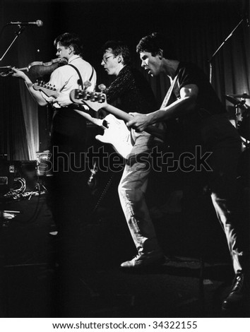 LONDON-NOVEMBER 9: The Fabulous Poodles, British pop group, perform live on stage on November 9, 1978 in London. L-R, Bobby Valentino, Tony De Meur, Ritchie Robinson.