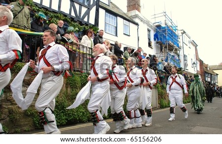 HASTINGS, ENGLAND - MAY 3: Morris dancers parade through the Old Town area during the annual Jack In The Green festival on May 3, 2010 in Hastings, East Sussex. The event marks the May Day holiday.