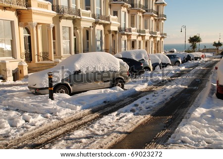 ST.LEONARDS-ON-SEA, ENGLAND - DECEMBER 3: Snow covers the road and cars in Warrior Square on December 3, 2010 at St.Leonards-on-Sea, East Sussex. It is the coldest Winter for 100 years in Britain.