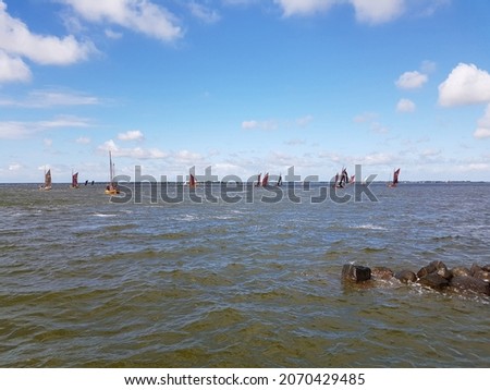 Similar – Image, Stock Photo Zeesboot Regatta on the Bodstedter Bodden.  Bodstedter Bodden is a part of the Darß-Zingster Bodden chain as well as the National Park Vorpommersche Boddenlandschaft.