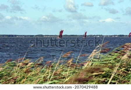 Similar – Image, Stock Photo Zeesboot Regatta on the Bodstedter Bodden.  Bodstedter Bodden is a part of the Darß-Zingster Bodden chain as well as the National Park Vorpommersche Boddenlandschaft.