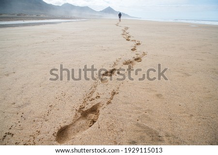 Similar – Foto Bild Fußabdrücke an einem Strand