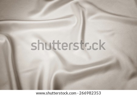 Smooth elegant beige silk background