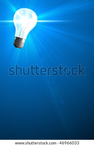 Radiating light bulb idea blue background with copy-space