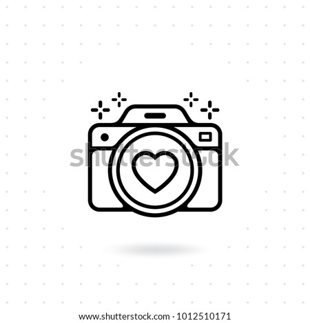 Vector for web and mobile applications. Photo camera outline vector icon. Camera icon with a heart symbol on the lens. Photography Vector illustration