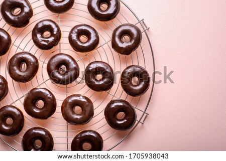 Similar – Image, Stock Photo Donuts aligned in a circle shape. Homemade fresh doughnuts, top view