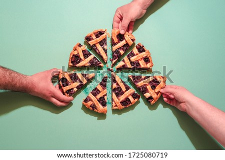 Similar – Image, Stock Photo Grabbing slice of cake. Raspberry pie with lattice top