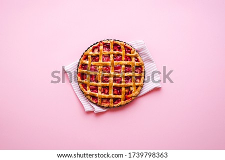 Similar – Image, Stock Photo Strawberry and rhubarb pie with a lattice crust. Fruits dessert