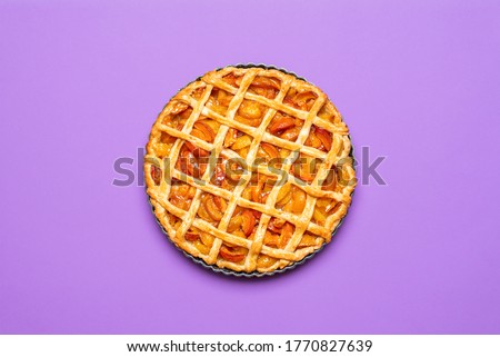 Similar – Image, Stock Photo Apricot pie in tray freshly baked. Top view of pie with a lattice crust