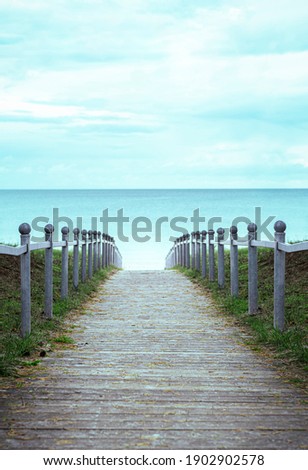 Similar – Foto Bild Holzweg zum Meer auf Sylt an einem Regentag