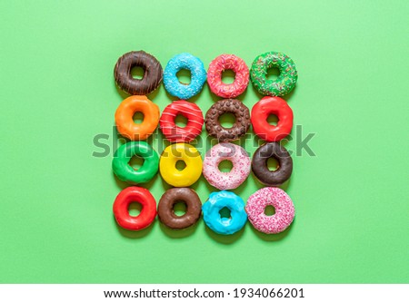 Similar – Image, Stock Photo Donuts aligned in a circle shape. Homemade fresh doughnuts, top view