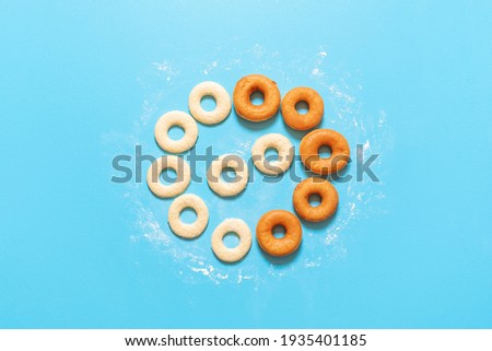 Similar – Image, Stock Photo Donuts aligned in a circle shape. Homemade fresh doughnuts, top view