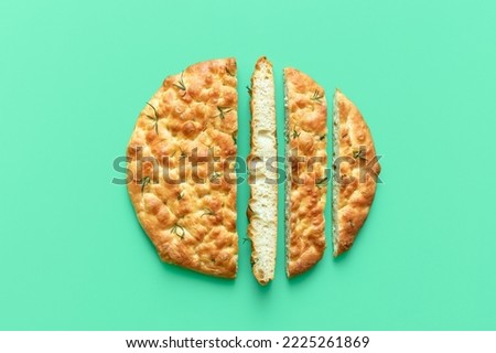 Image, Stock Photo Homemade Italian Focaccia, with tomato and olive oil on a rustic wooden background.