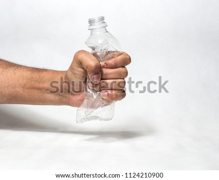 Similar – Image, Stock Photo Empty plastic squashed bottles collected to recycling