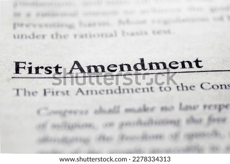 legal or law book with first amendment freedom of speech, religion, assemble, press and petition from Bill of Rights 1791 focused in closeup of explanation Foto stock © 