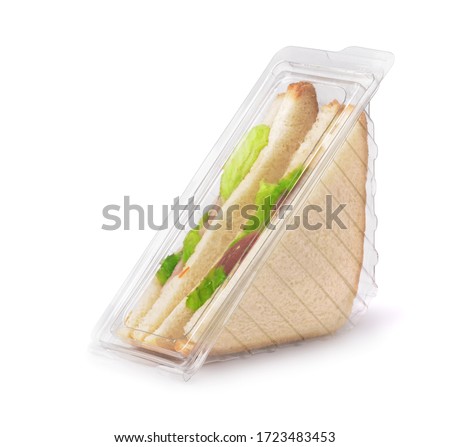 Sandwiches in clear plastic package isolated on white