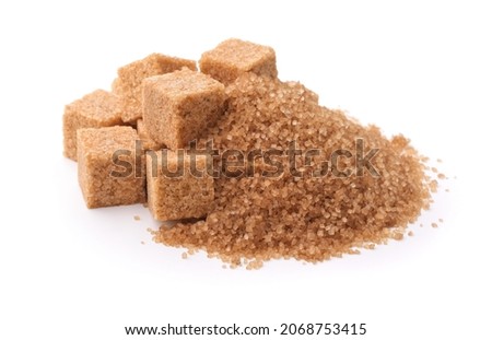 Pile of brown granulated sugar and sugar cubes isolated on white Foto d'archivio © 