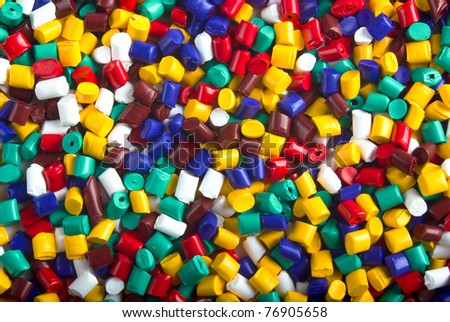 Colorful industrial plastic granules background