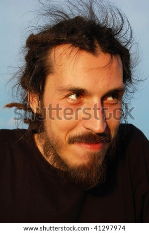 the attractive man, expression  on the light background