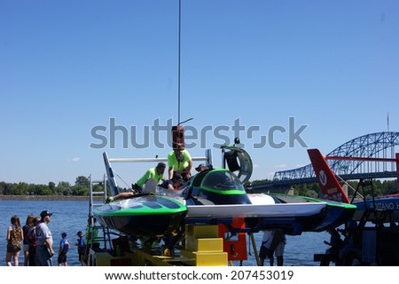 KENNEWICK, WA - JULY 25 : Hydroplane racing boat be worked on by crew during Tri-Cities Water Follies annual event