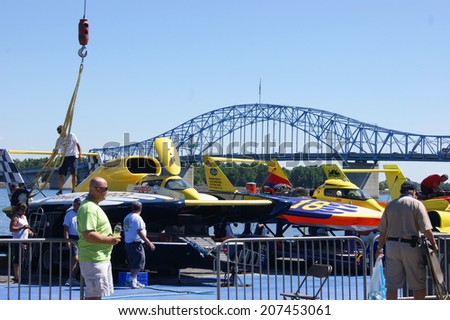 KENNEWICK, WA - JULY 25 : Hydroplane racing boats being worked on by crew during  Tri-Cities Water Follies annual event