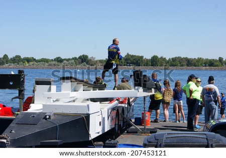KENNEWICK, WA - JULY 25 : Hydroplane racing boat crew watches during Tri-Cities Water Follies annual event
