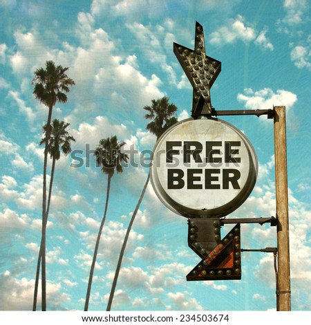 aged and worn vintage photo of free beer sign