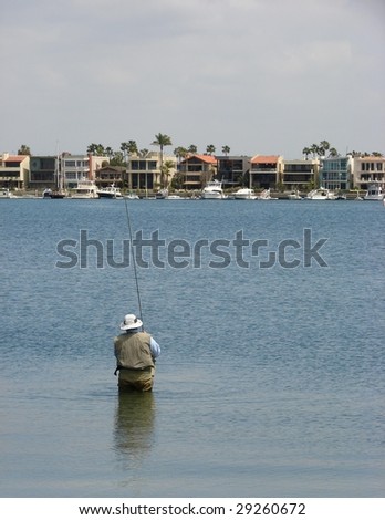 Fisherman with Houses in the Background