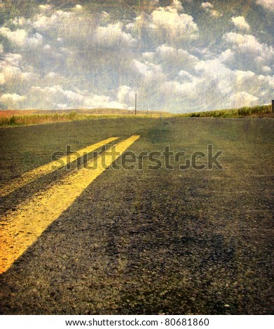 aged vintage photo of desolate road and landscape