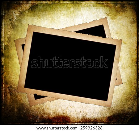 Two old paper frames with frayed edges on dirty background