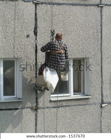 renovation worker on a block of flats #3