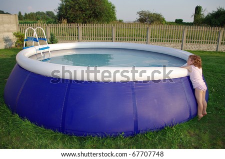 Small child with big pool