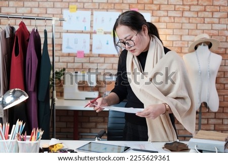 Similar – Image, Stock Photo Aged female drawing on paper in apartment