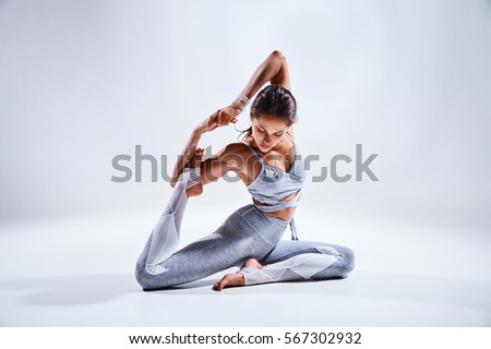 Image, Stock Photo Cheerful athletes practicing yoga together in mountain pose in contemporary workout room