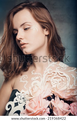 Portrait of a beautiful brunette girl  on grunge  background