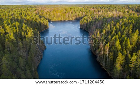 Similar – Foto Bild Gefrorener Haukkalampi-See an bewölktem Tag im Nuuksio Nationalpark