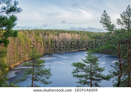 Similar – Foto Bild Gefrorener Haukkalampi-See an bewölktem Tag im Nuuksio Nationalpark