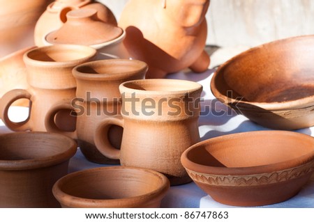 Jugs and plates in in the morning light