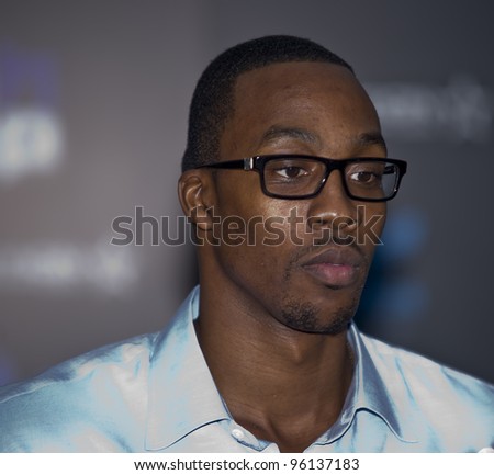 ORLANDO, FLORIDA - FEB. 24: Basketball star Dwight Howard attends the VIP All-Star party hosted by him and Adidas.  FEB. 24, 2012 in Orlando Florida.