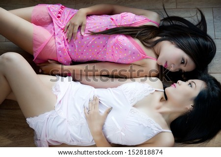 A couple asian women on floor