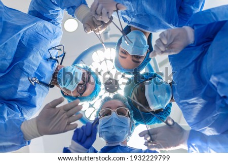 Similar – Image, Stock Photo Female surgeon in operating theater