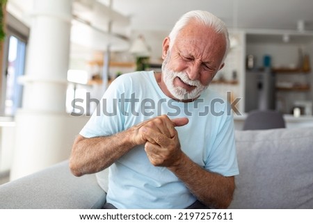 Similar – Image, Stock Photo Man with his hands in his pockets looks at the sky