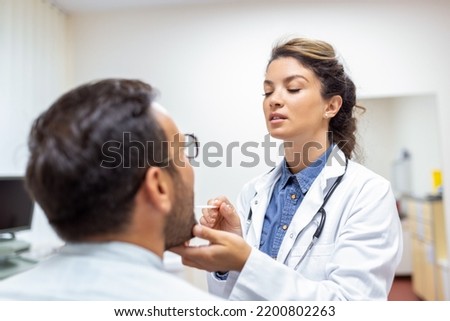 Similar – Image, Stock Photo Female doctor looking out the hospital window